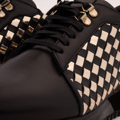 The Mackenzie Black Gold Woven Leather Sneaker