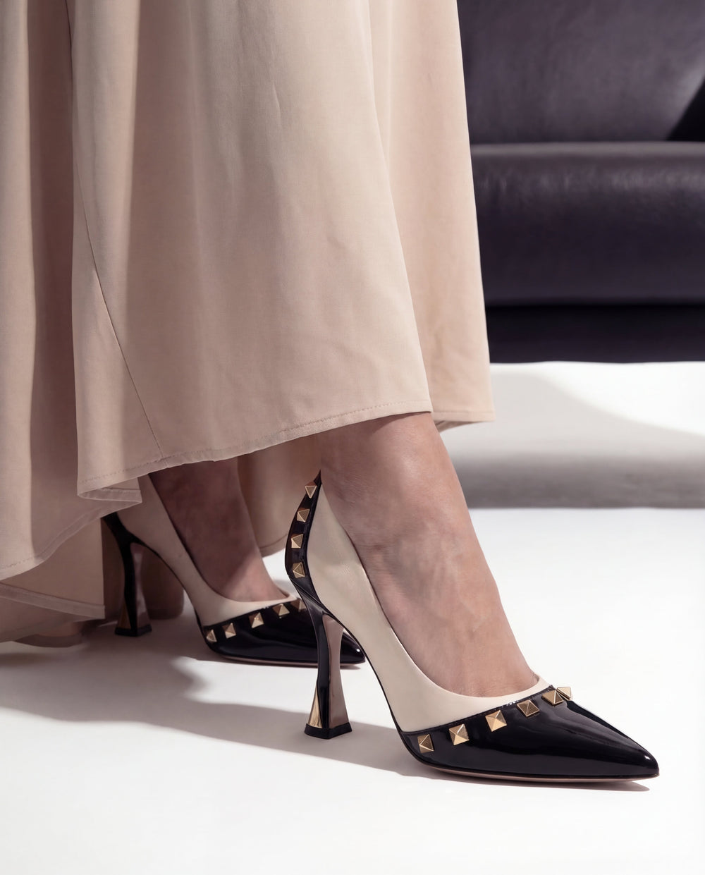 The Bella Vita Studded Beige Black Leather Pump Shoe