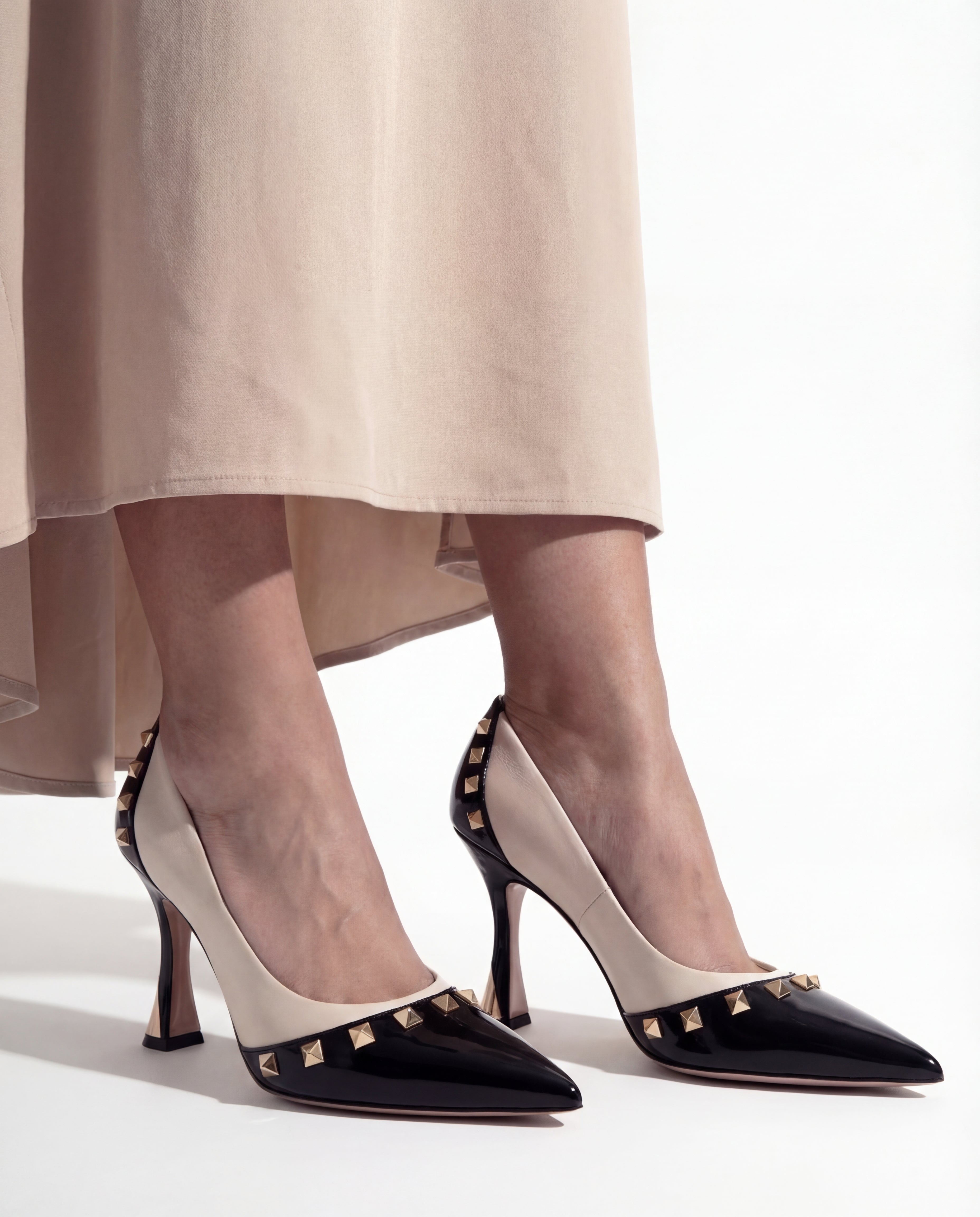 The Bella Vita Studded Beige Black Leather Pump Shoe