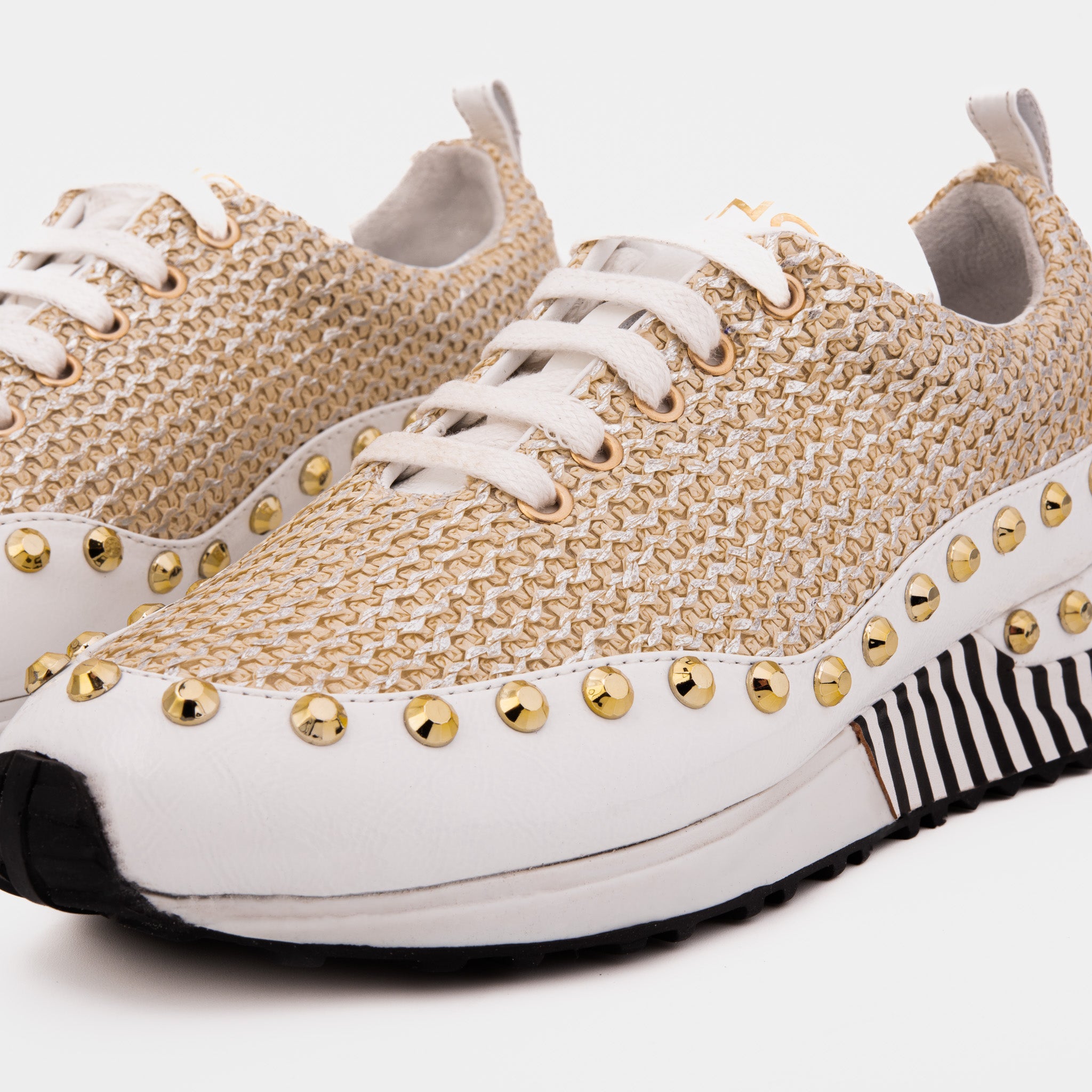 The Aurelia White Gold Woven Leather Sneaker