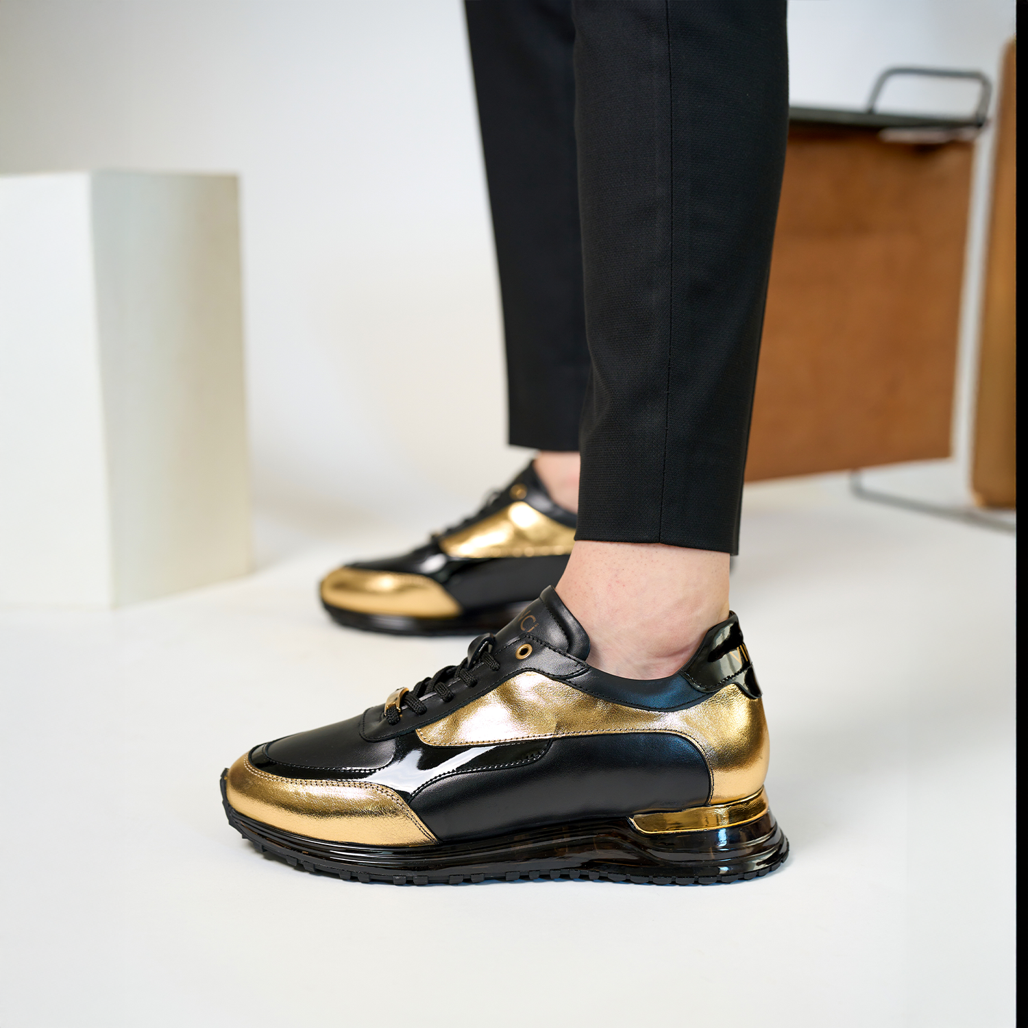 The Arda Black Gold Leather Sneaker