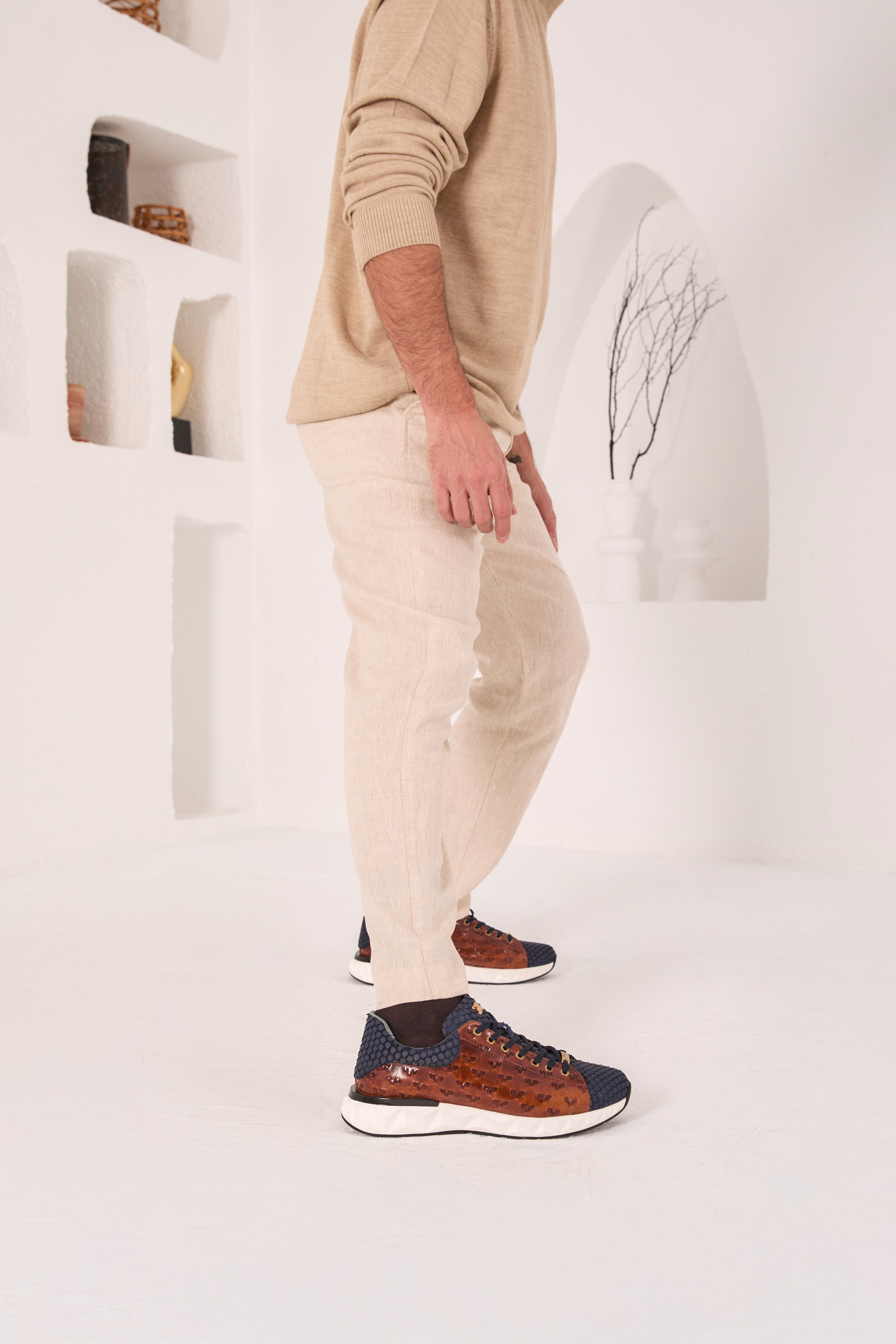 The Caesars Navy Tan Leather Sneaker