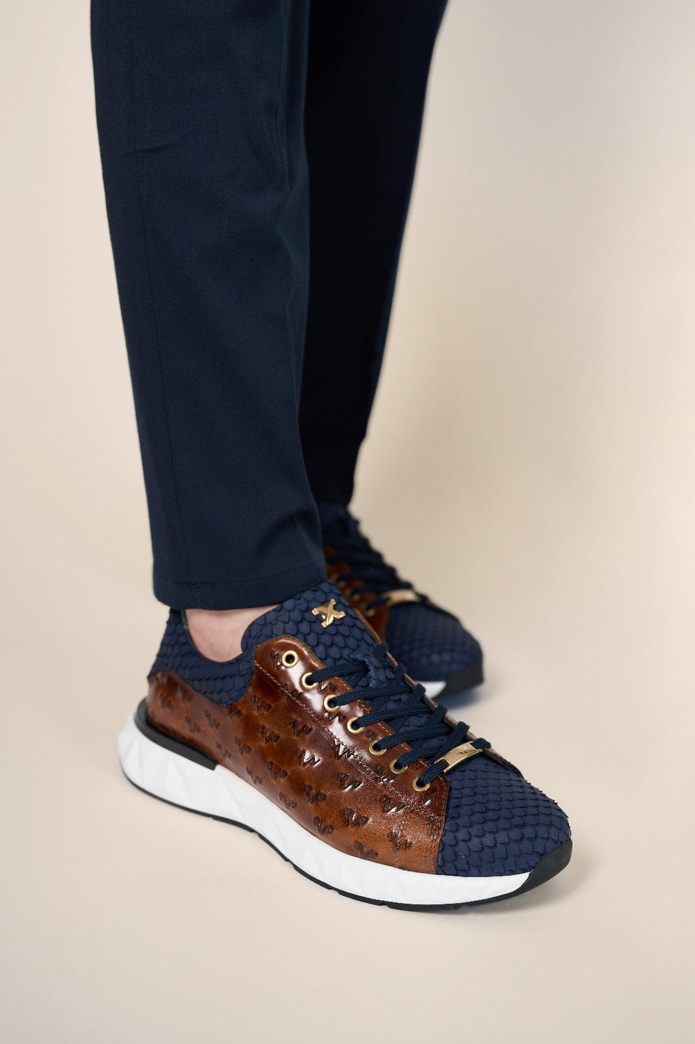 The Caesars Navy Tan Leather Sneaker