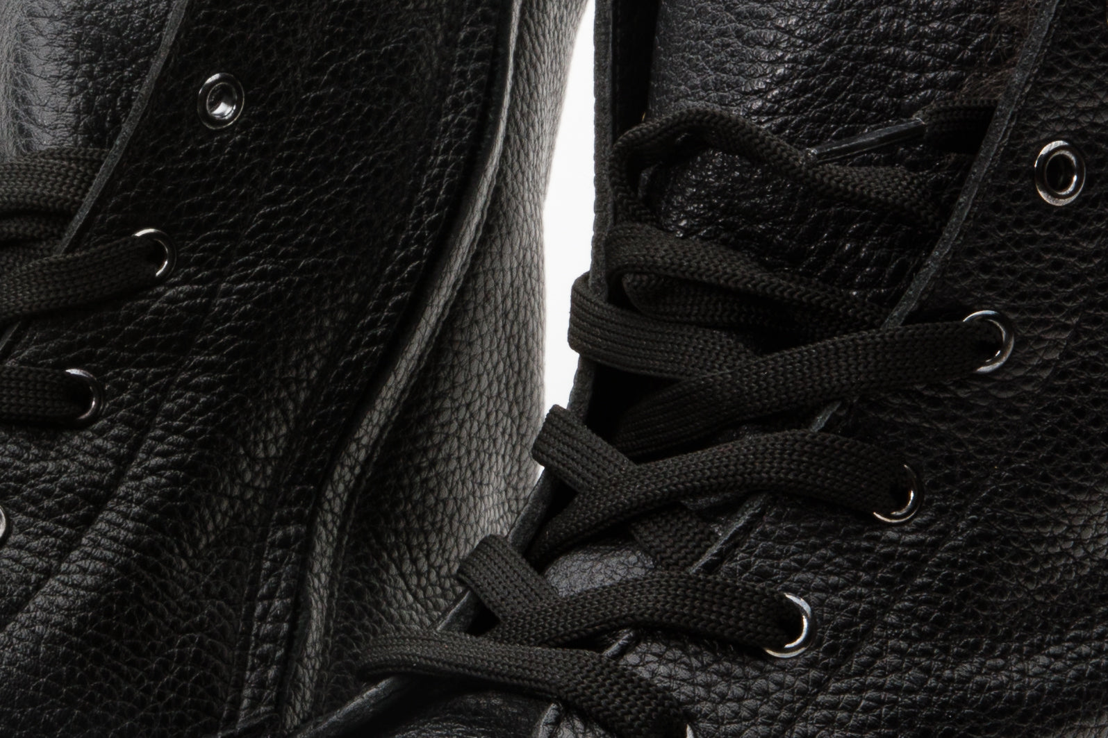 The Kajapati Black Leather Natural Fur Mid Calf Boot