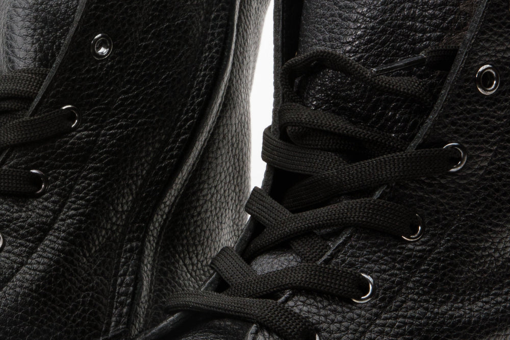 The Kajapati Black Leather Natural Fur Mid Calf Boot
