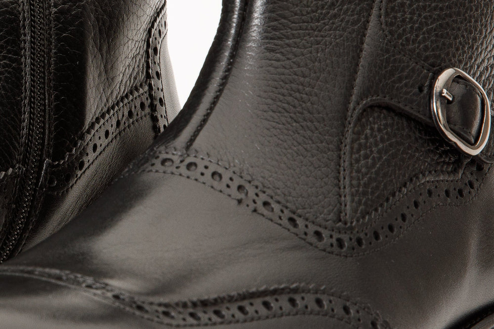 The Rand Black Leather Double Buckle Brogue Boot with a Zipper