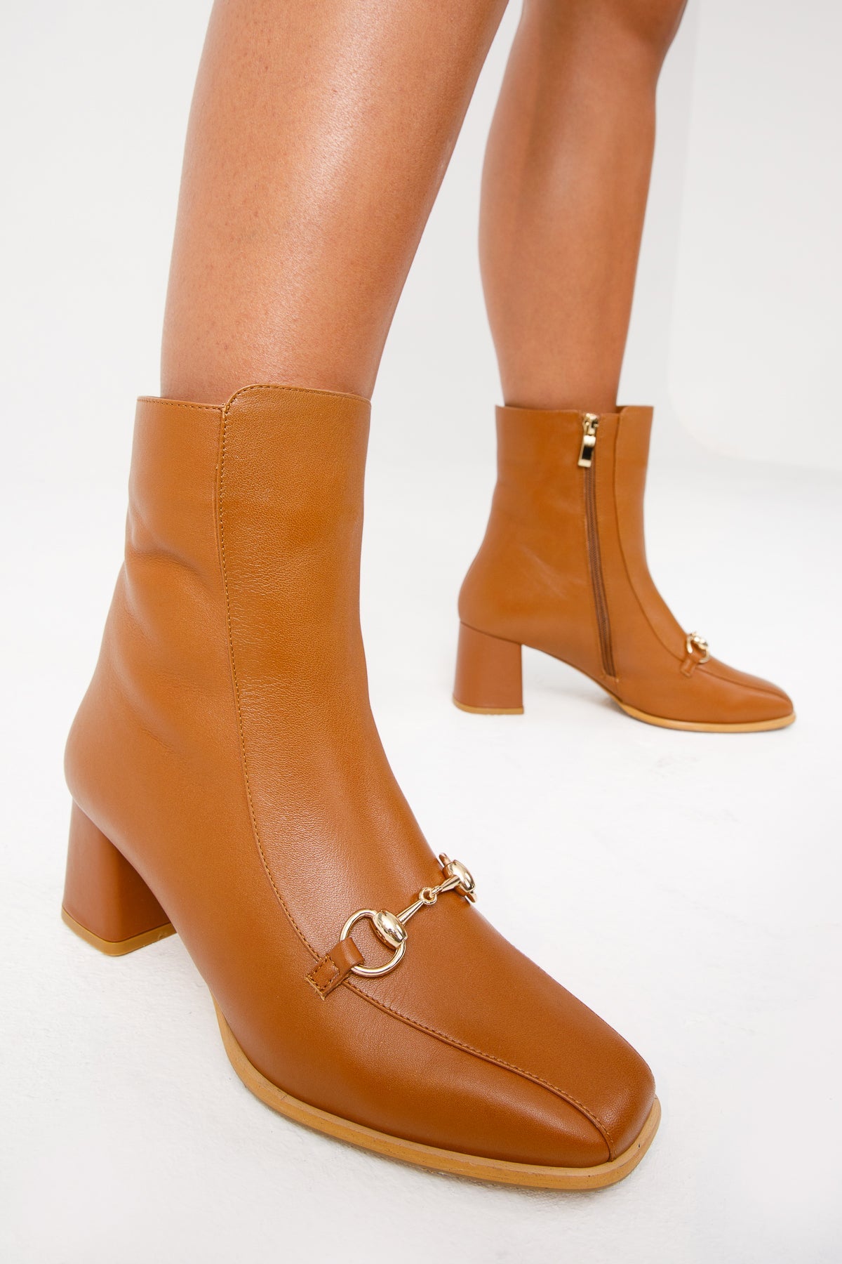 The Bukres Tan Leather Block Heel Mid Calf Boot