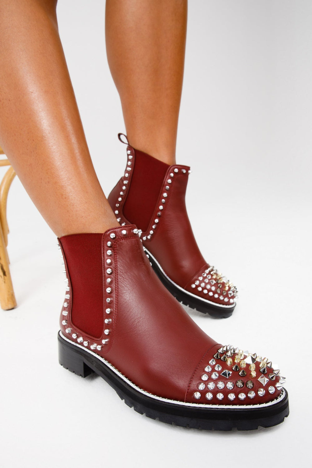 The Vuvulane Burgundy Spike Leather Ankle  Boot