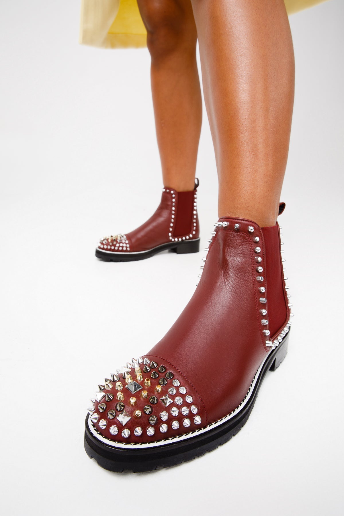 The Vuvulane Burgundy Spike Leather Ankle  Boot