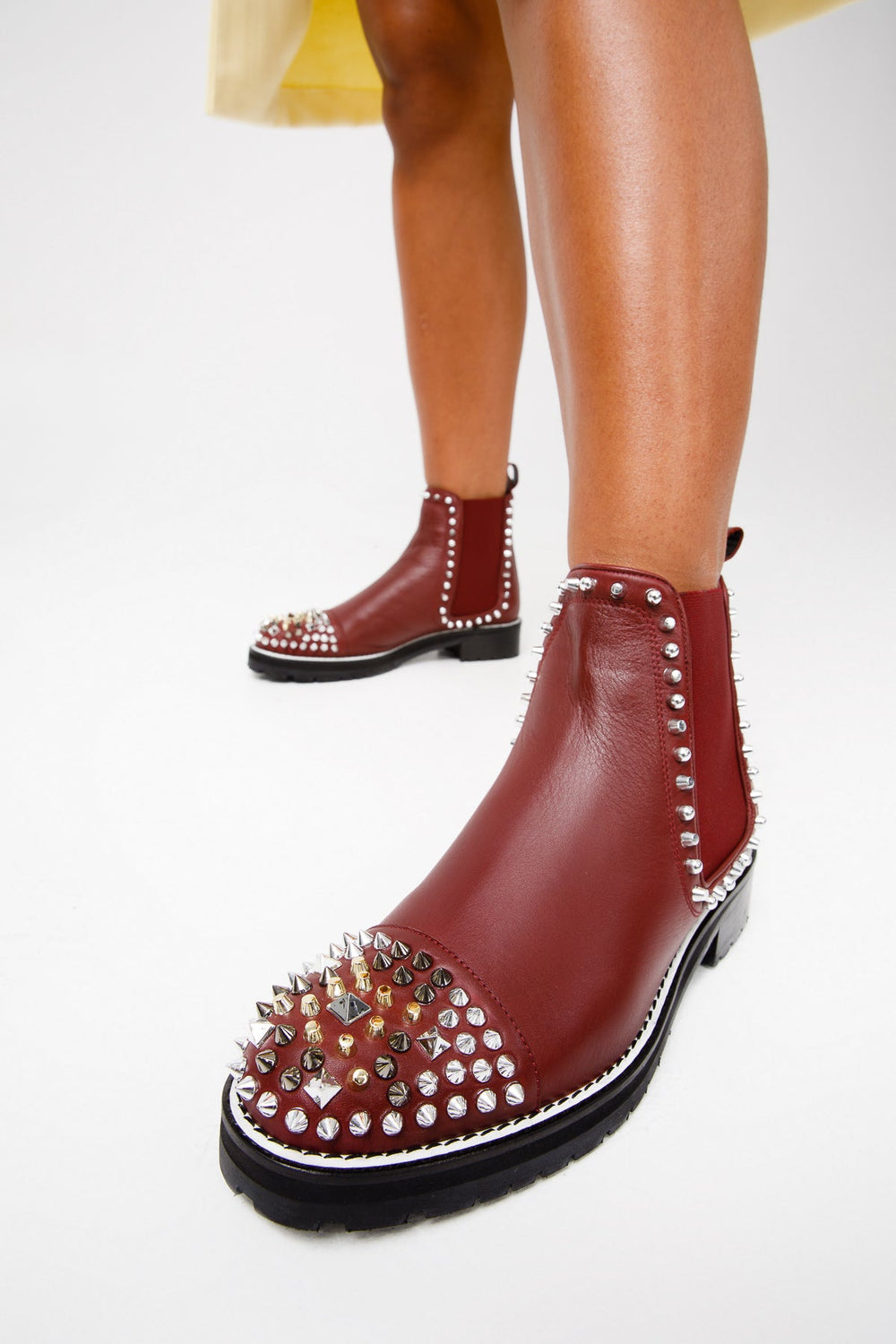 The Vuvulane Burgundy Spike Leather Ankle  Boot