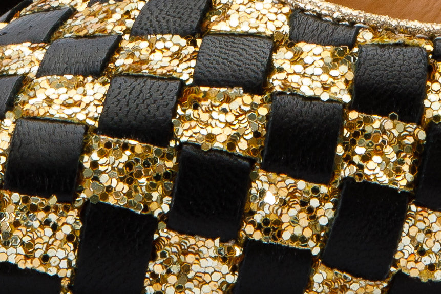 The Saks Tory Gold Black Handwoven Leather Pump Shoe