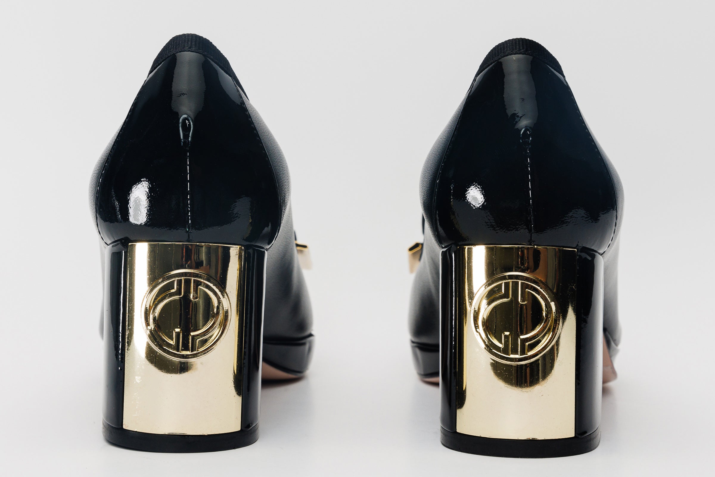 The Fano Black Leather Cap Toe Block Heel Pump Shoe