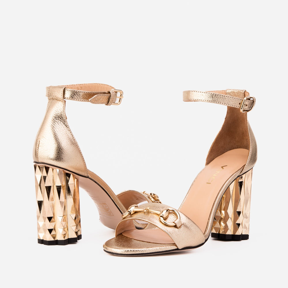 The Avlonya Block Heel Gold Leather Ankle Strap Sandal