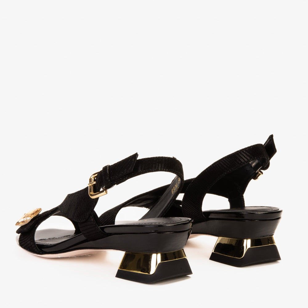 The Iconic Black Leather Sandal