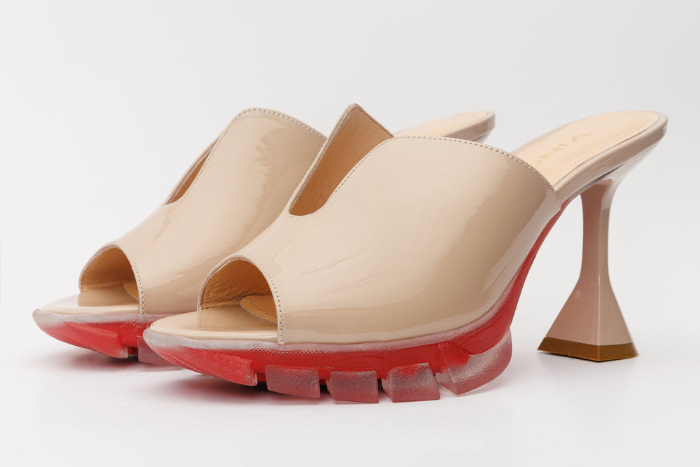 The Caratal Cream Patent Leather Sandal