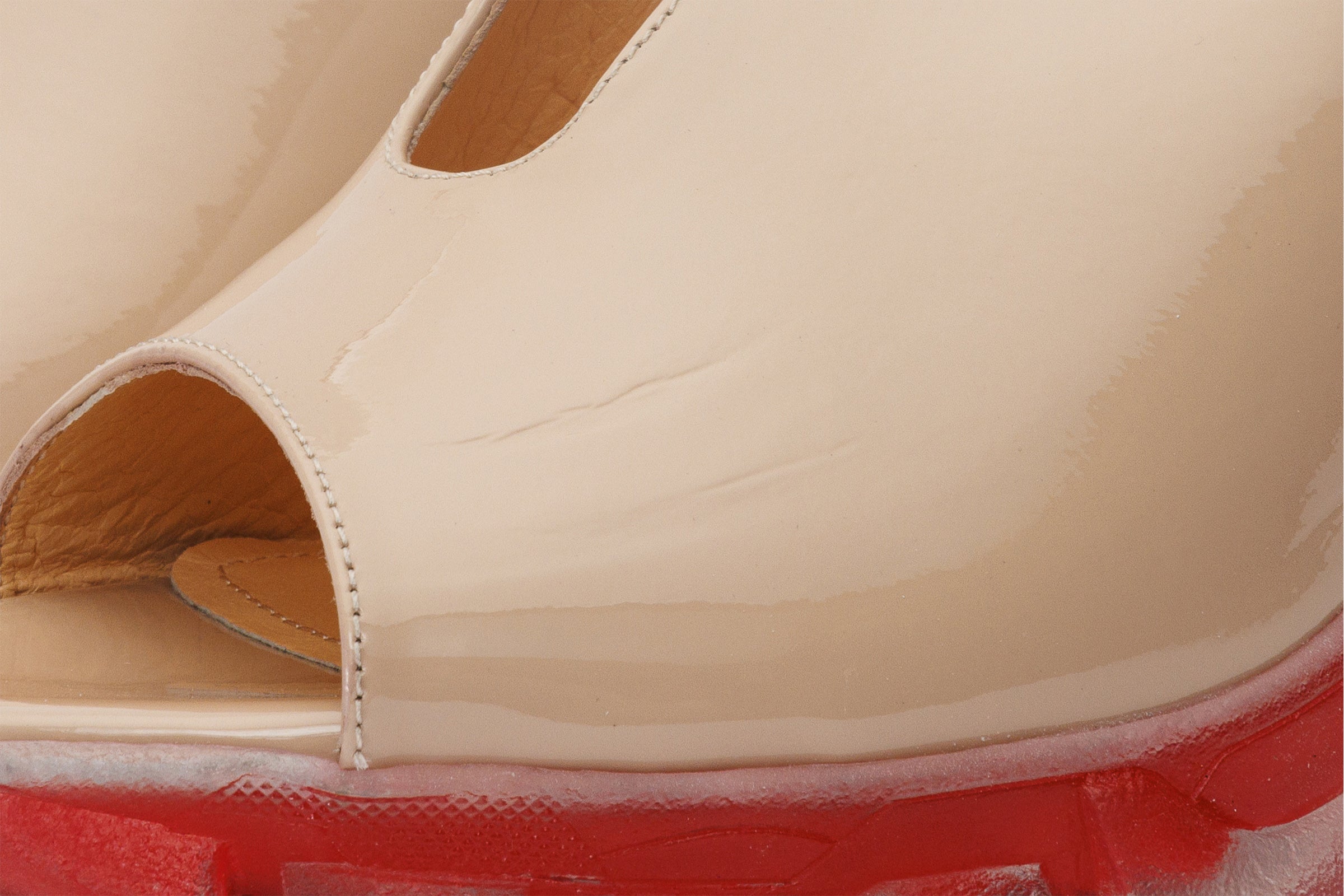 The Caratal Cream Patent Leather Sandal